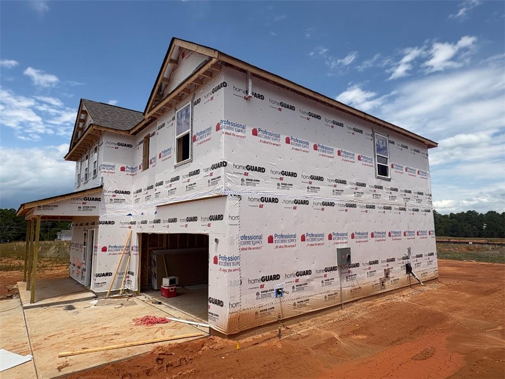 129 Cedar Shoals Easley, SC 29640 - Photo 2 of 8 This newly framed home awaits its finishing touches, offering a canvas for your dream living space.