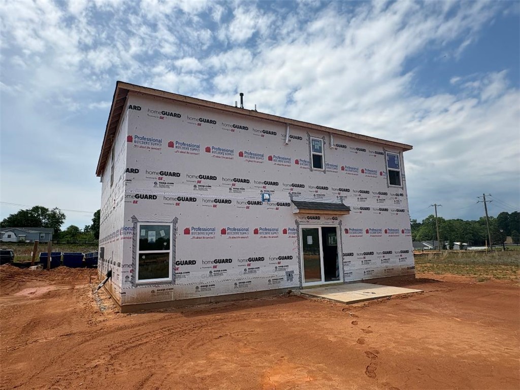 129 Cedar Shoals Easley, SC 29640 - Photo 3 of 8 This new construction features a strong foundation and a sturdy, unfinished exterior ready for customization.