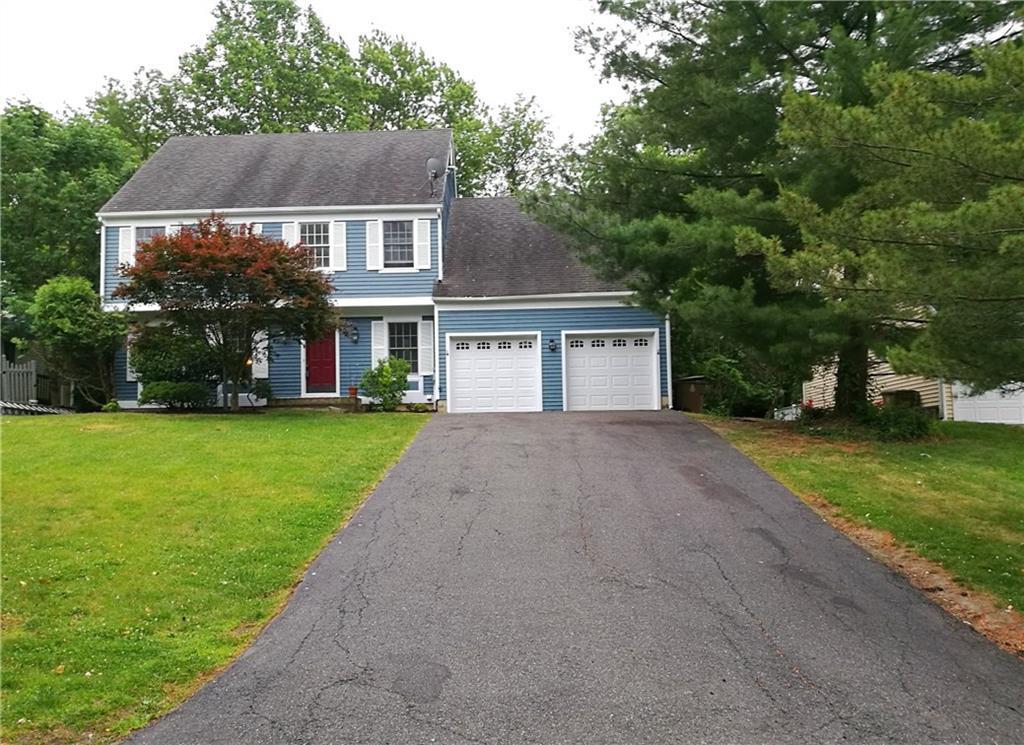 48 Fieldstone Road Stamford, CT 06902 - Photo 1 of 1 front view of house with a yard