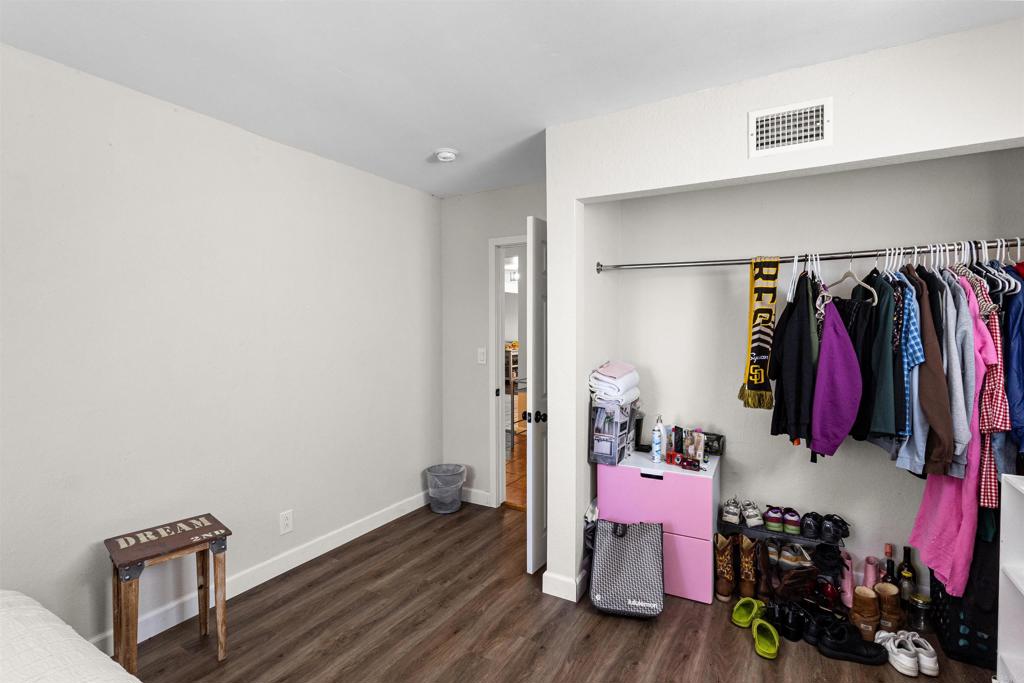 3340 Skytrail Ranch Road Jamul, CA 91935 - Photo 25 of 38 a view of walk in closet with clothes and shoes