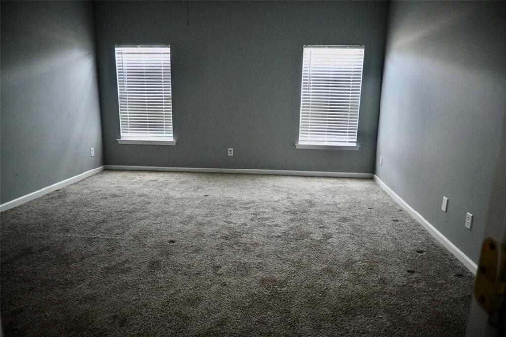 1563 Rachel's Ridge Northwest Kennesaw, GA 30152 - Photo 15 of 29 an empty room with windows