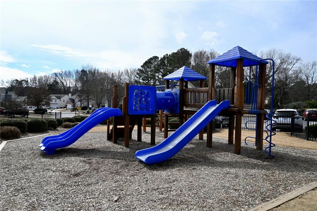 1563 Rachel's Ridge Northwest Kennesaw, GA 30152 - Photo 23 of 29 a view of a park with slide