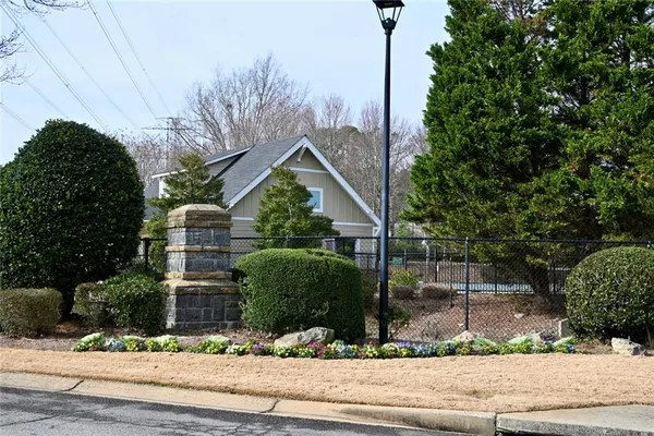 a view of a house and a yard