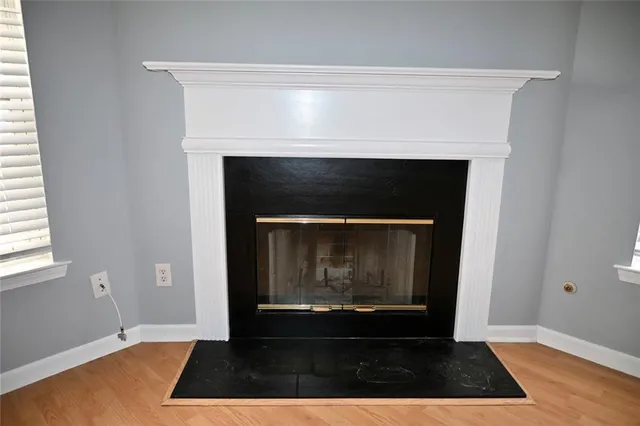 a living room with a fireplace