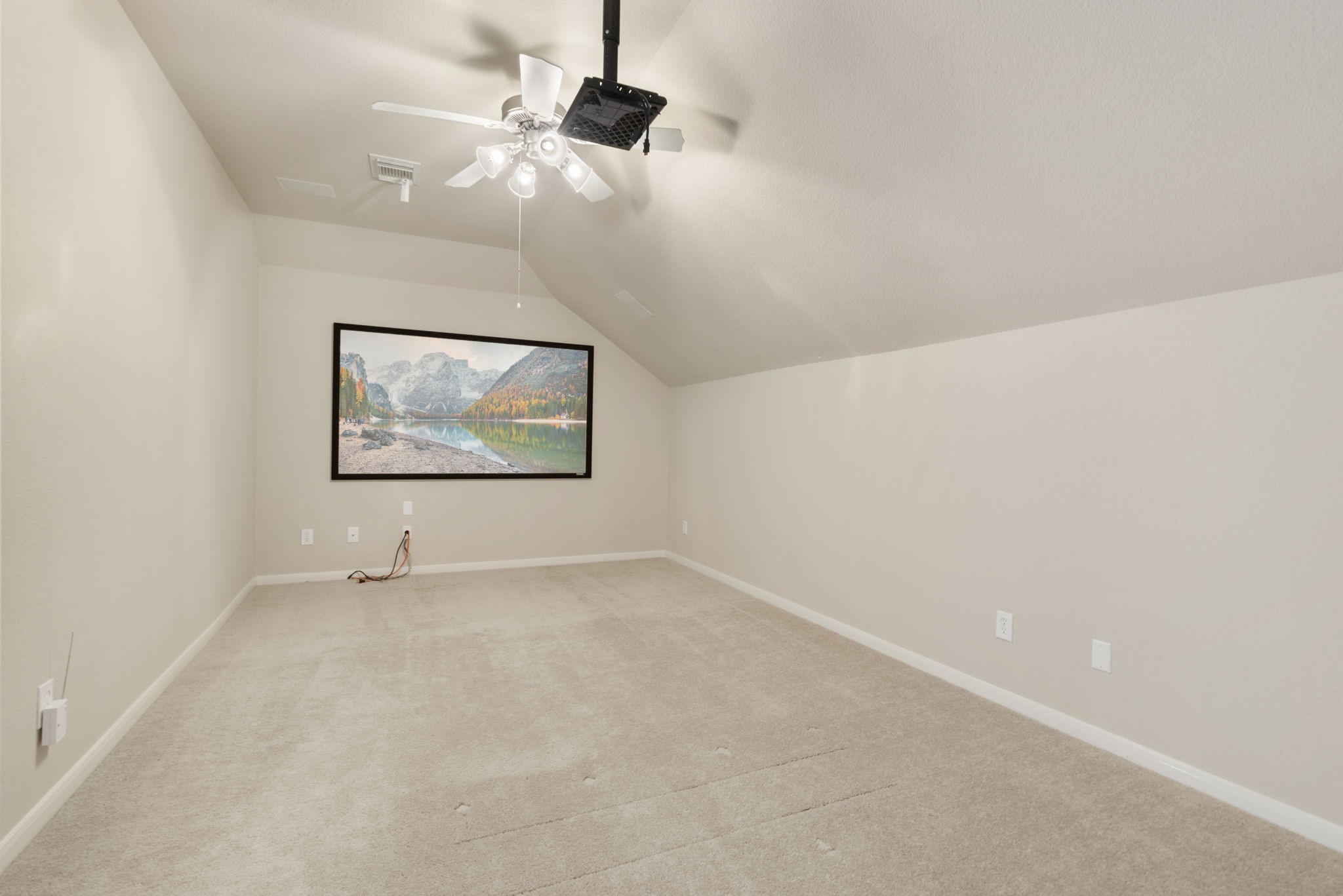 19222 Senterra Lakes Boulevard Spring, TX 77379 - Photo 29 of 45 Double doors open into a dedicated media room, prepped for movie nights with a built-in projector mount and a large projector screen!