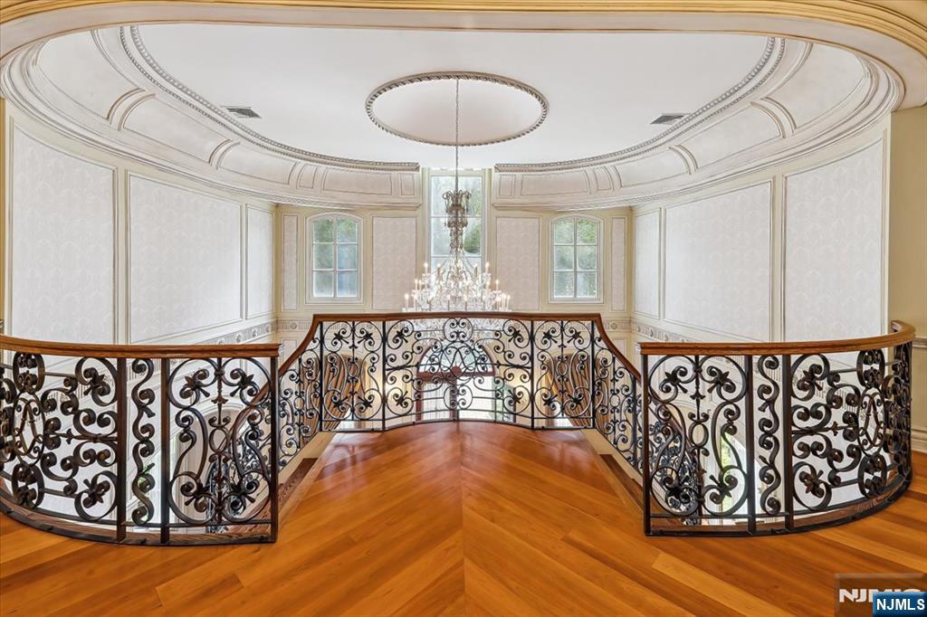 47 Fox Hedge Road Saddle River, NJ 07458 - Photo 11 of 22 a view of a room with wooden floor and windows