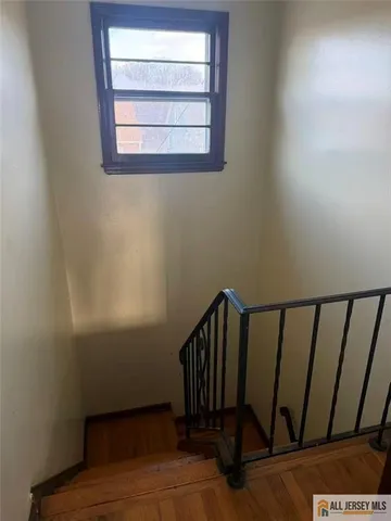 a utility room with sink dryer and washer