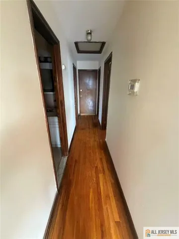 a bathroom with a toilet a sink and shower