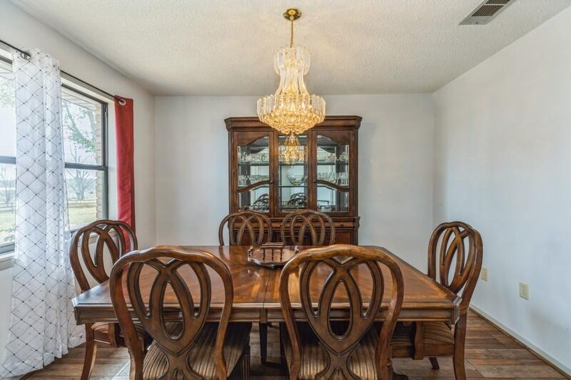 6246 Holloway Road Baker, FL 32531 - Photo 16 of 52 a view of a dining room with furniture window and outside view