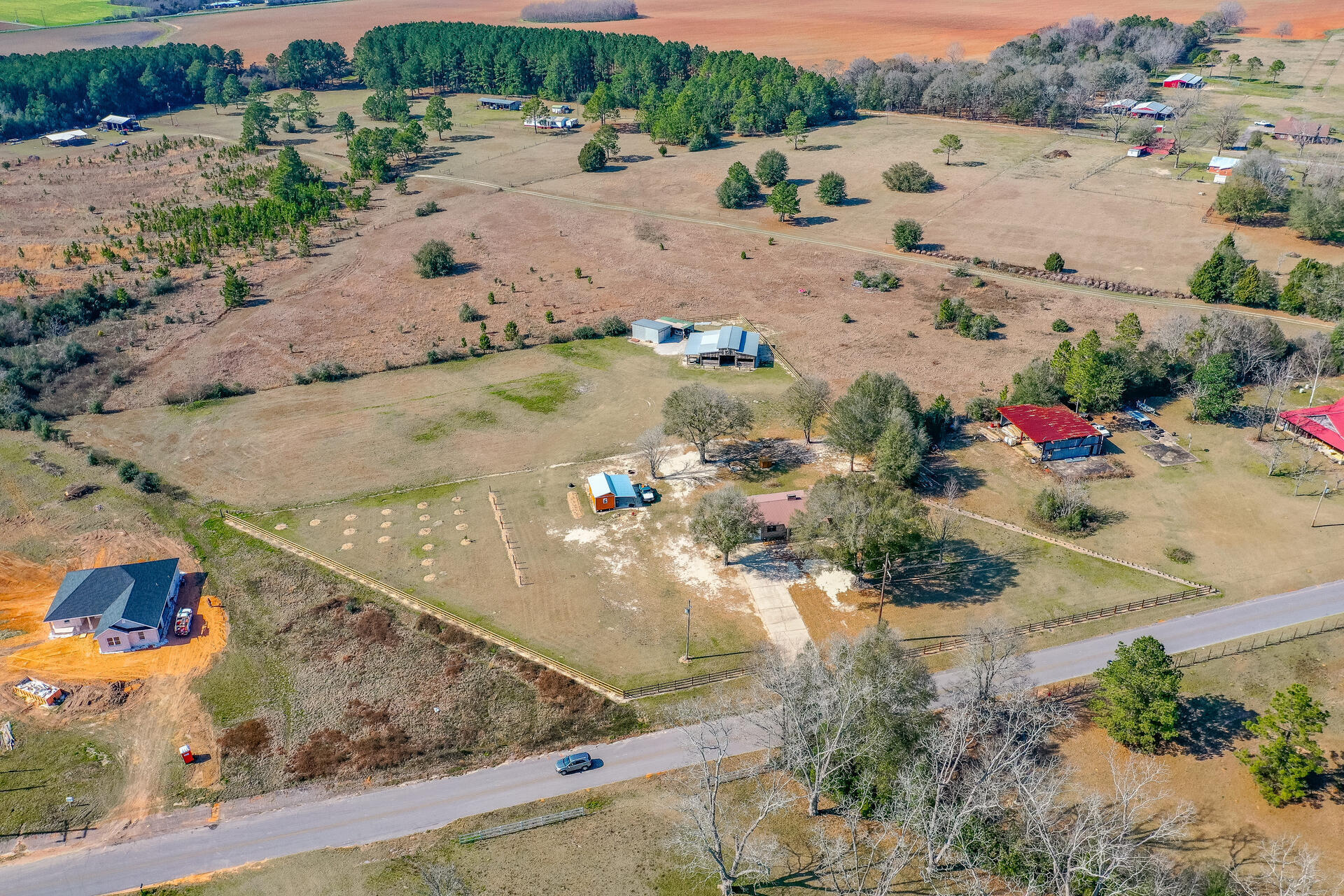 6246 Holloway Road Baker, FL 32531 - Photo 48 of 52 an aerial view of a house with a yard