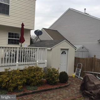 1403 Bretton View Road Annapolis, MD 21409 - Photo 24 of 30 a front view of a house with garden