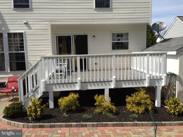 1403 Bretton View Road Annapolis, MD 21409 - Photo 25 of 30 a front view of a house with a garden