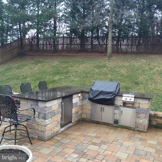 1403 Bretton View Road Annapolis, MD 21409 - Photo 29 of 30 a view of a chairs and table in the patio