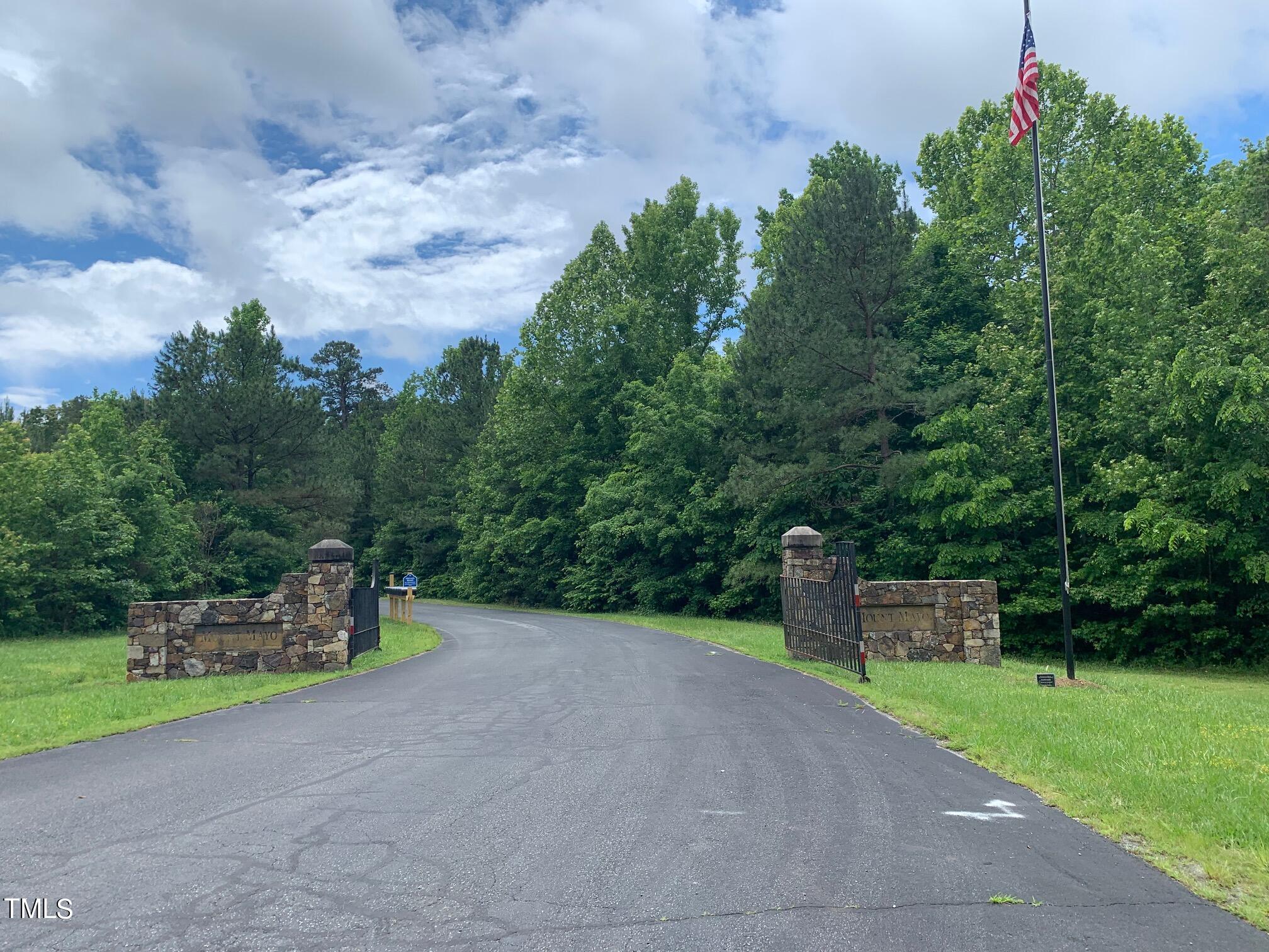 0 New Mayo Drive Roxboro, NC 27574 - Photo 6 of 9 a green field with trees in the background