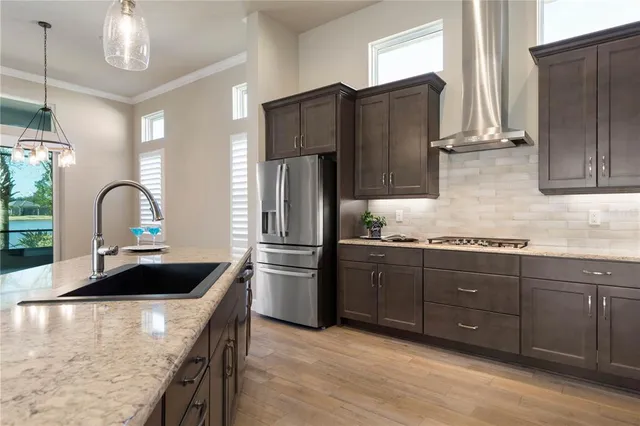 a spacious bathroom with a double vanity sink and a mirror