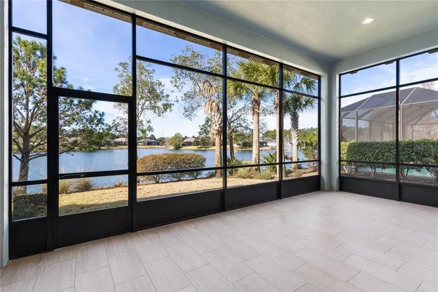 a view of an empty room and closet area