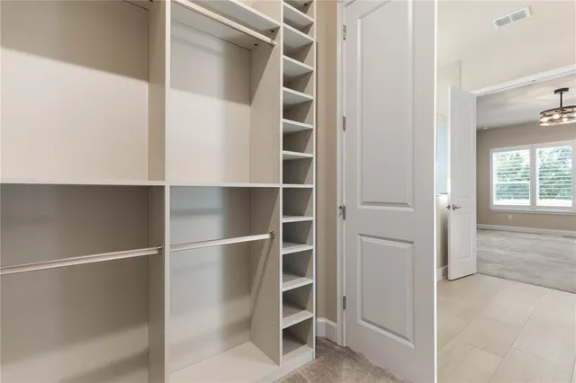 a view of a lake with a yard