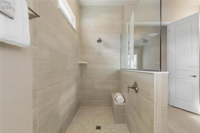 a view of a swimming pool with a yard