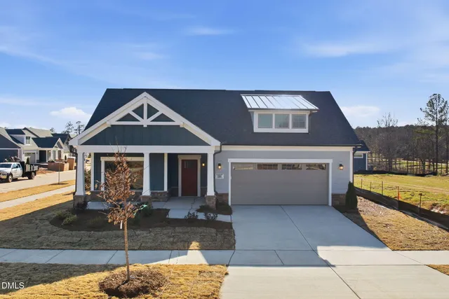 a front view of a house with outdoor space