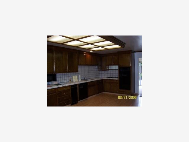 6118 Bollinger Road San Jose, CA 95129 - Photo 8 of 8 a kitchen with a sink and cabinets