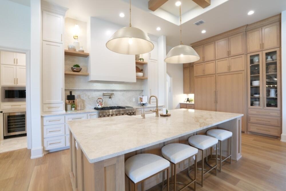 4101 149th Street Lubbock, TX 79423 - Photo 4 of 53 an open kitchen with a table and chairs in it