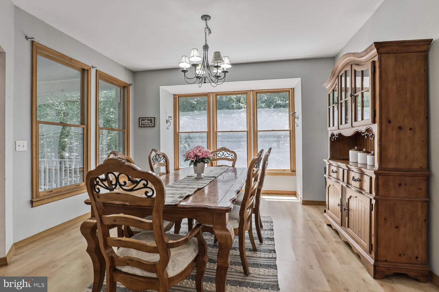 1761 Buckner Road Bumpass, VA 23024 - Photo 24 of 43 a view of a dining room with furniture window and outside view