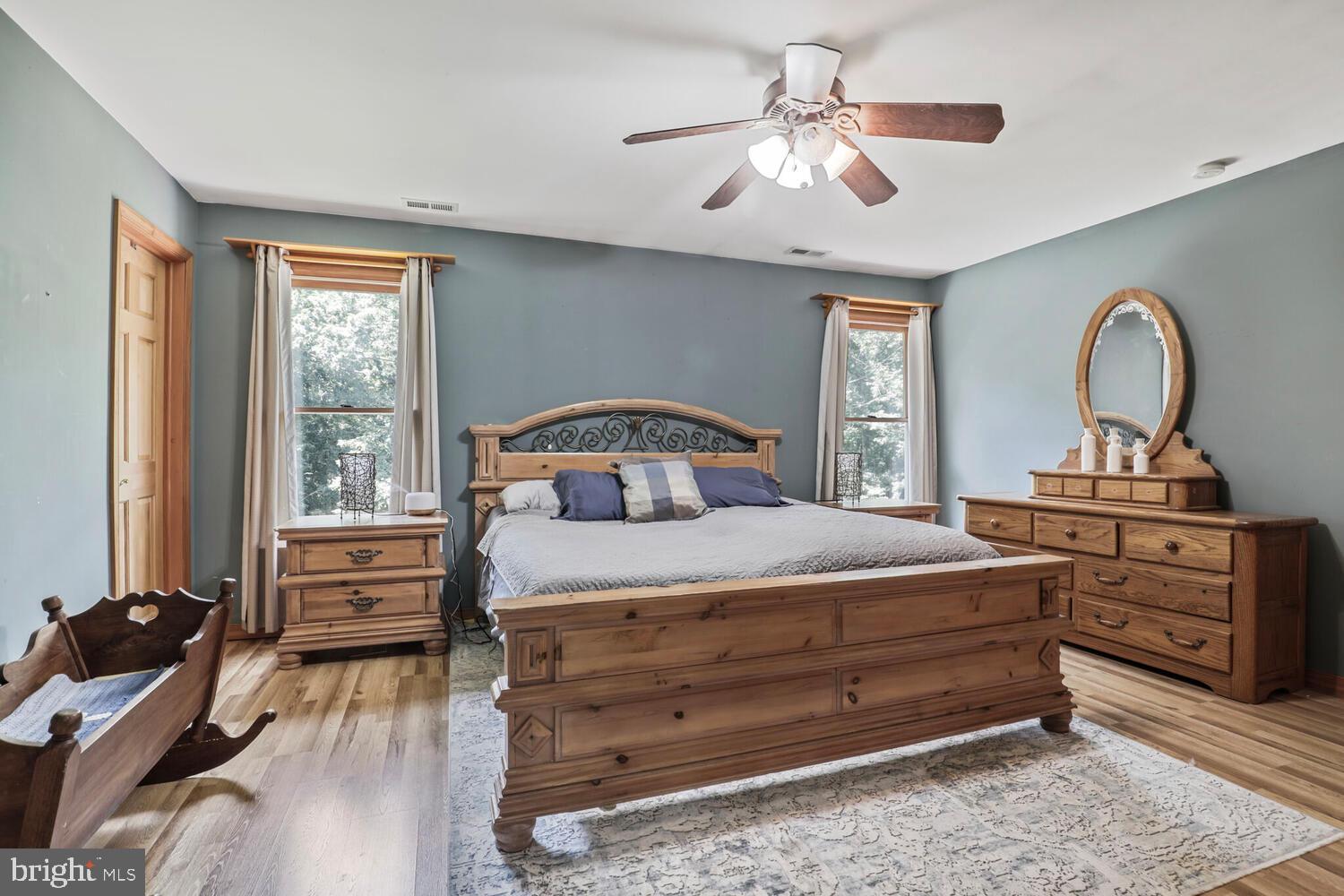 1761 Buckner Road Bumpass, VA 23024 - Photo 31 of 43 a bedroom with a bed and a dresser with the outer view