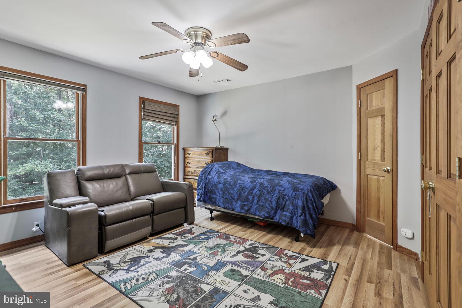 1761 Buckner Road Bumpass, VA 23024 - Photo 38 of 43 a bedroom with furniture and windows