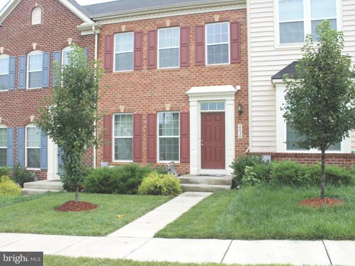 2630 St Marys View Road Accokeek, MD 20607 - Photo 1 of 25 a view of a brick building next to a yard
