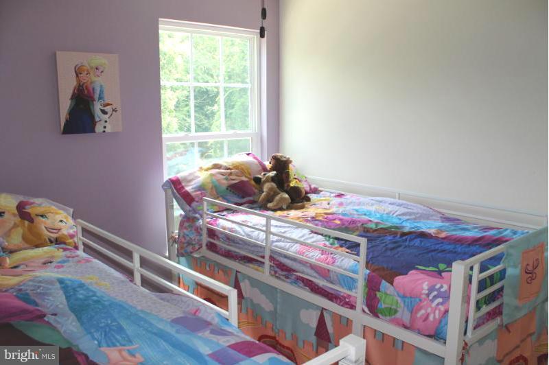 2630 St Marys View Road Accokeek, MD 20607 - Photo 16 of 25 a bedroom with bed and a window