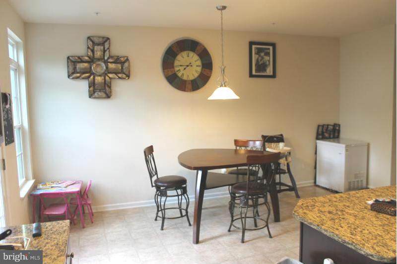 2630 St Marys View Road Accokeek, MD 20607 - Photo 6 of 25 a view of a dining room with furniture