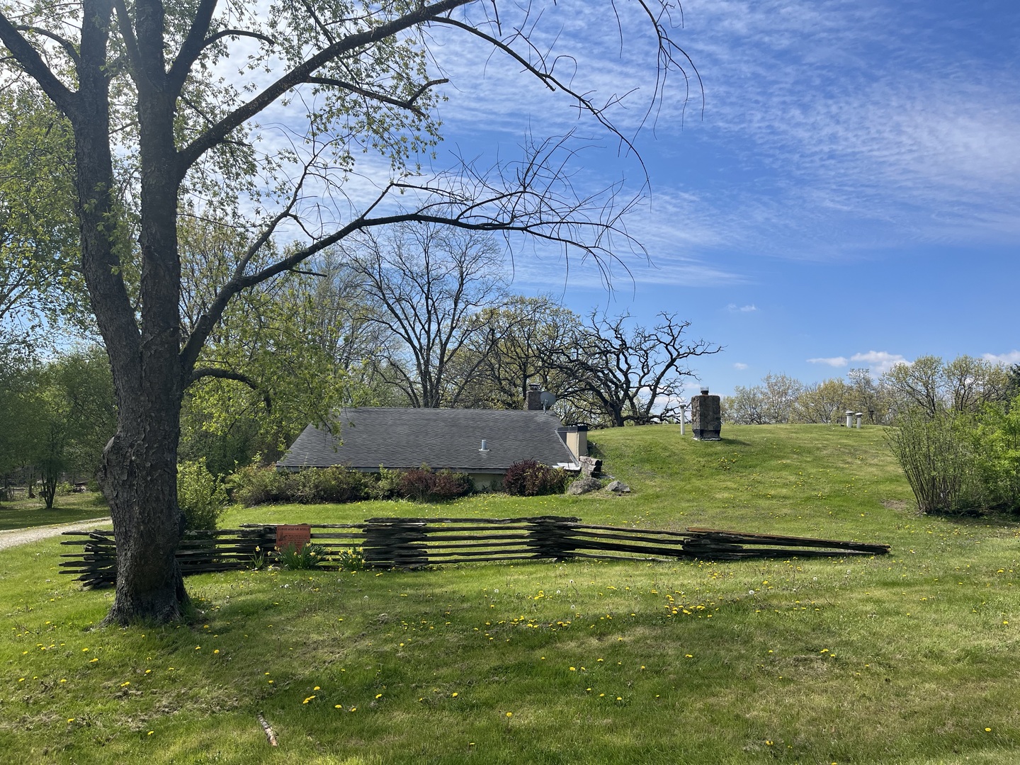 6519 Rowland Road Huntley, IL 60142 - Photo 2 of 12 a view of a garden
