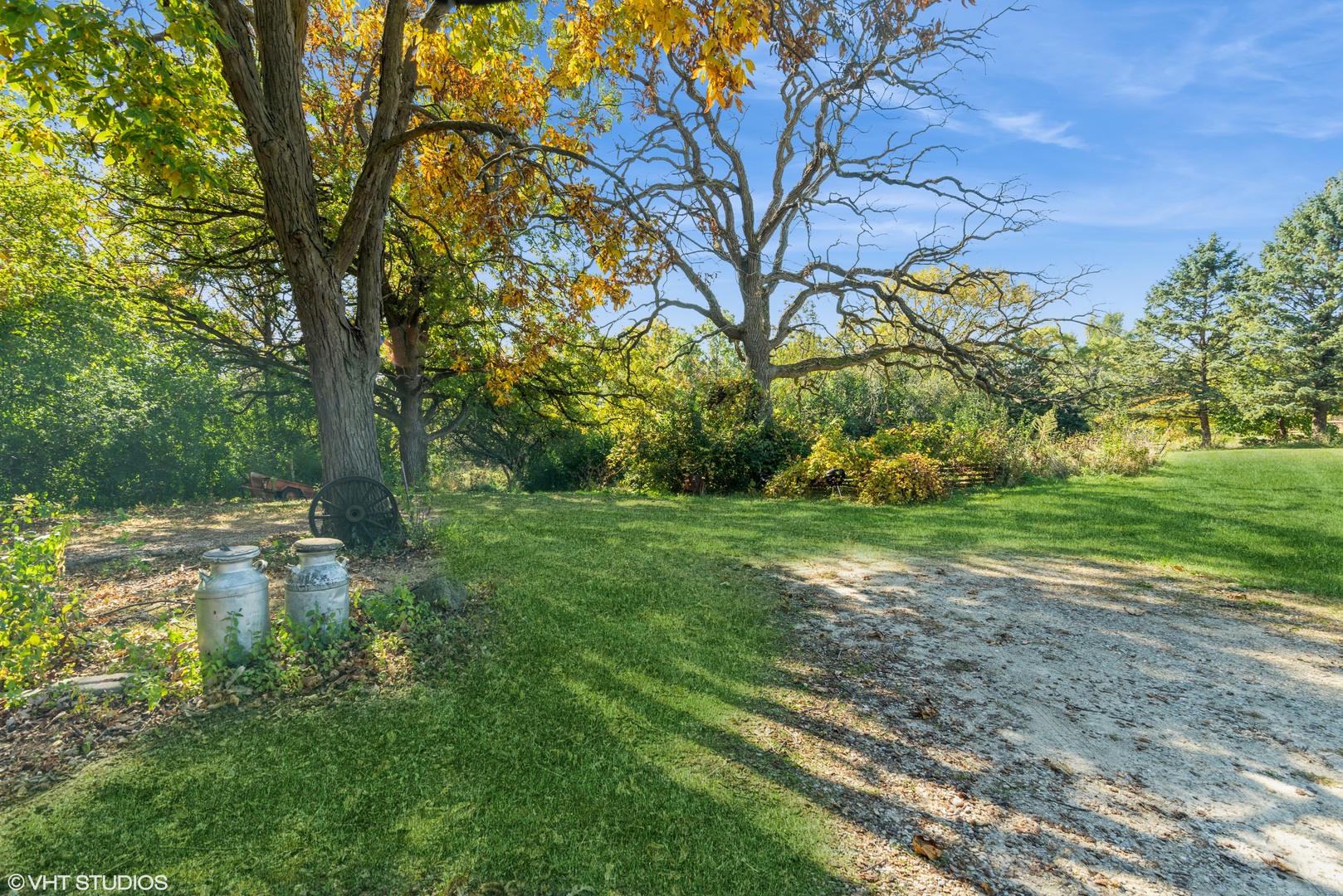 6519 Rowland Road Huntley, IL 60142 - Photo 4 of 12 a backyard of a house with lots of green space