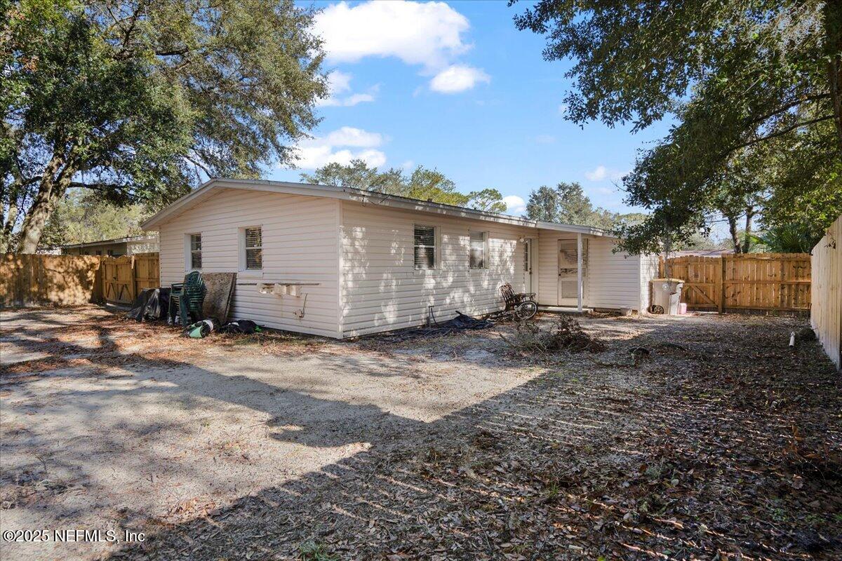 8514 Oak Leaf Road Jacksonville, FL 32208 - Photo 22 of 23 a view of a house with backyard