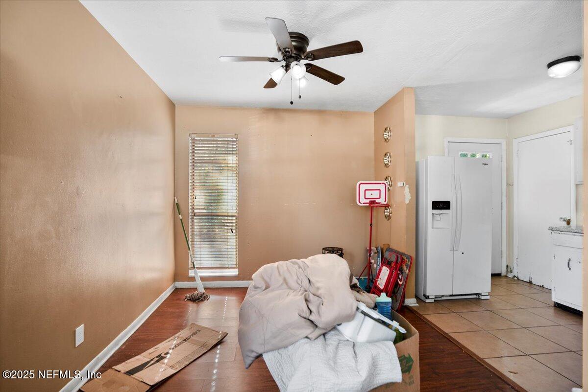 8514 Oak Leaf Road Jacksonville, FL 32208 - Photo 7 of 23 a living room with furniture and a window