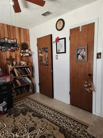 a view of a hallway with workspace