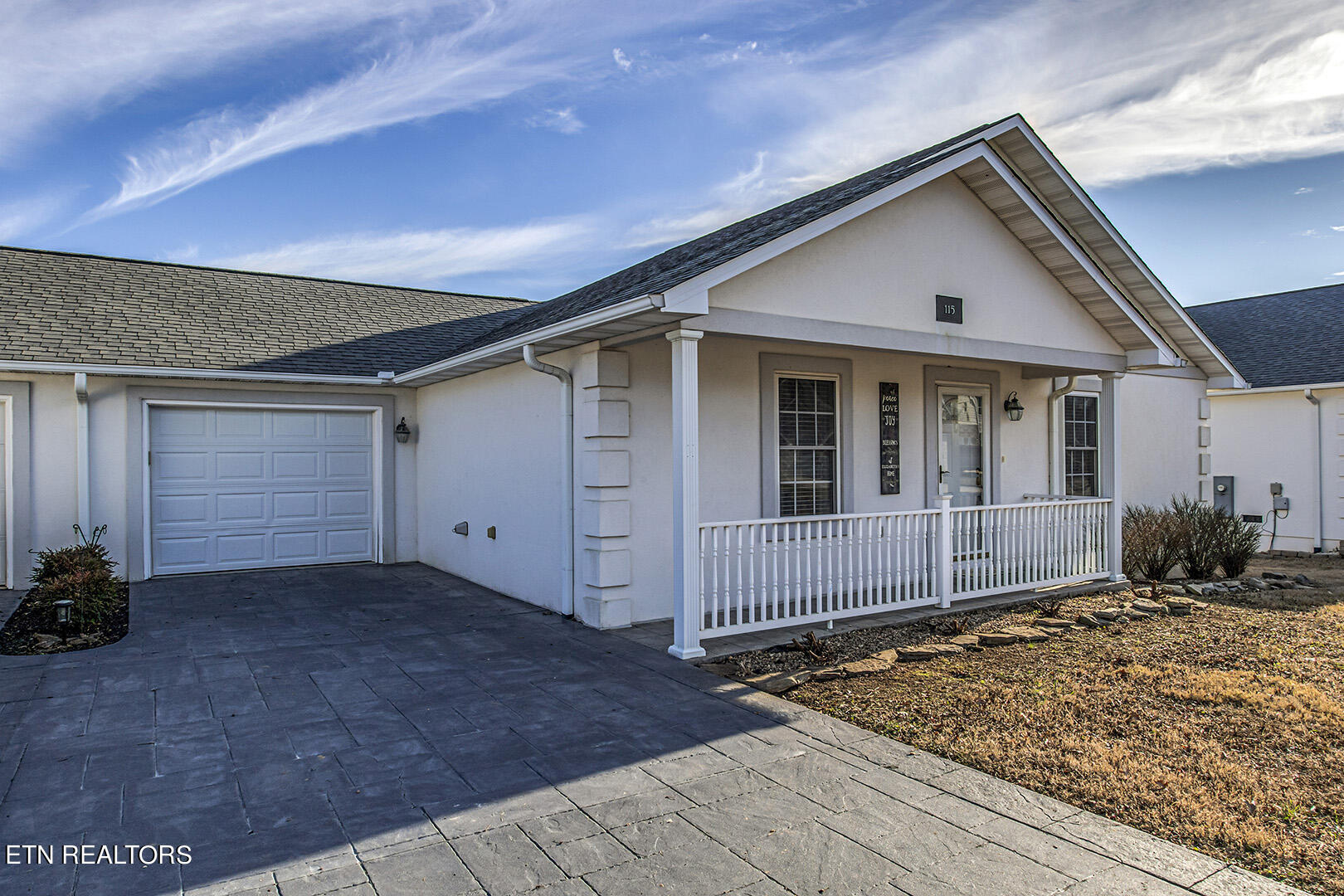 115 Greystone Way Kingston, TN 37763 - Photo 3 of 40 03_GreystoneWay_115_Garage-FrontPorchEnt