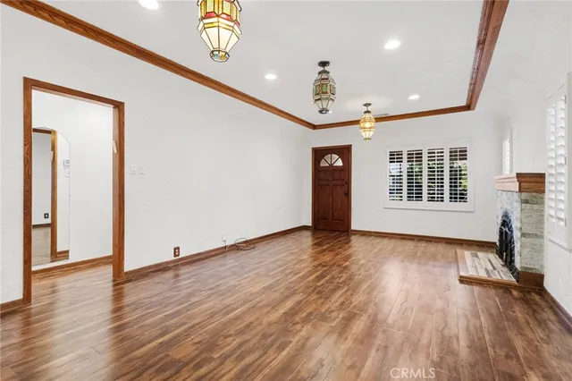 a view of livingroom with hardwood floor and a ceiling fan