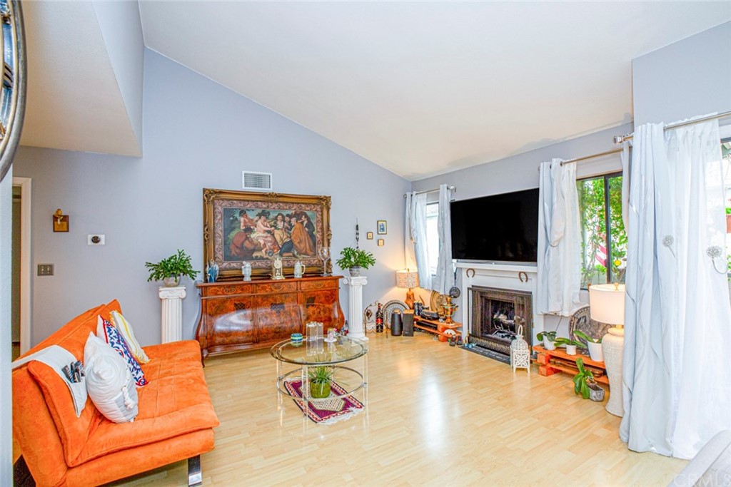 10504 Sunland Boulevard, Unit 5 Sunland, CA 91040 - Photo 11 of 66 a living room with furniture and a flat screen tv
