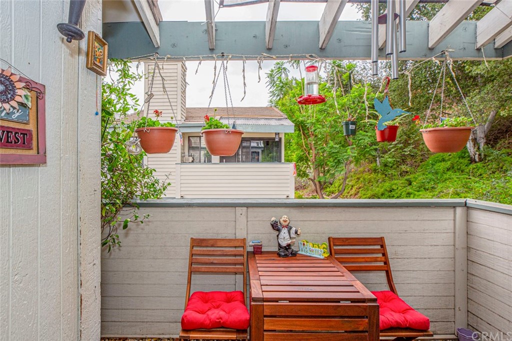 10504 Sunland Boulevard, Unit 5 Sunland, CA 91040 - Photo 31 of 66 a backyard of a house with seating space