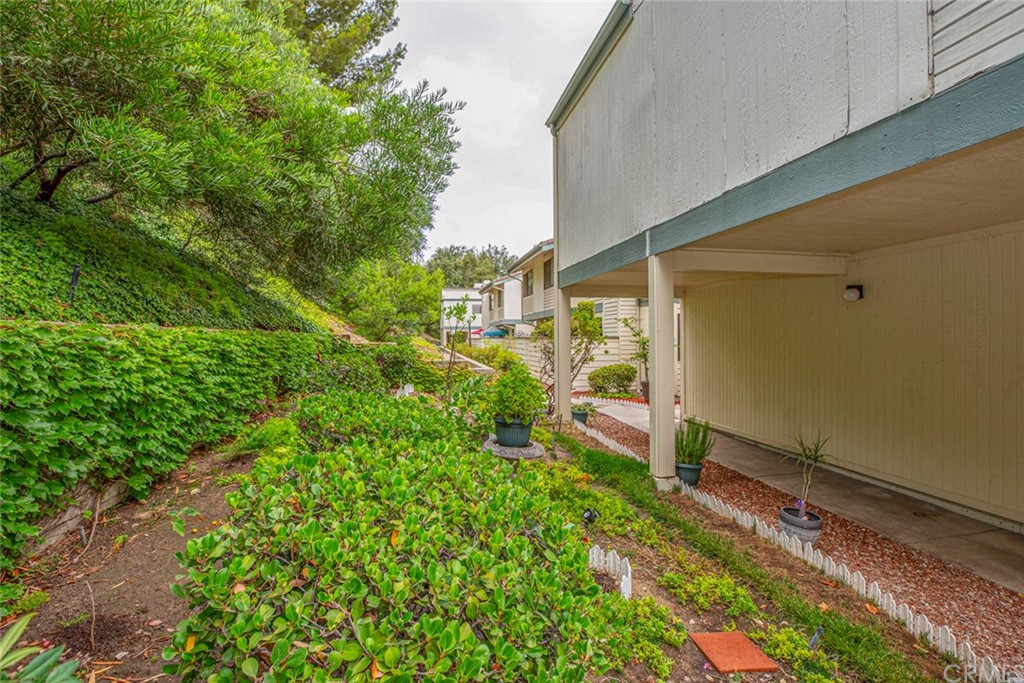10504 Sunland Boulevard, Unit 5 Sunland, CA 91040 - Photo 39 of 66 a backyard of a house with table and chairs