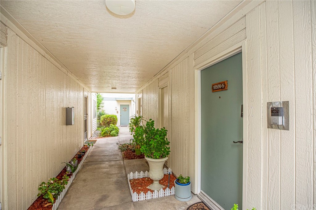 10504 Sunland Boulevard, Unit 5 Sunland, CA 91040 - Photo 43 of 66 a hallway with furniture and a potted plant