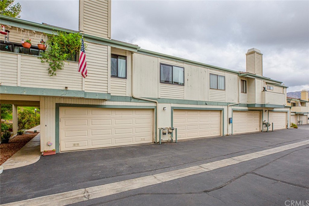 10504 Sunland Boulevard, Unit 5 Sunland, CA 91040 - Photo 47 of 66 a front view of a house with a garage