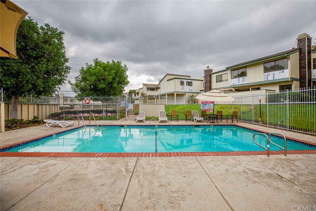 10504 Sunland Boulevard, Unit 5 Sunland, CA 91040 - Photo 55 of 66 a view of swimming pool with a lounge chairs