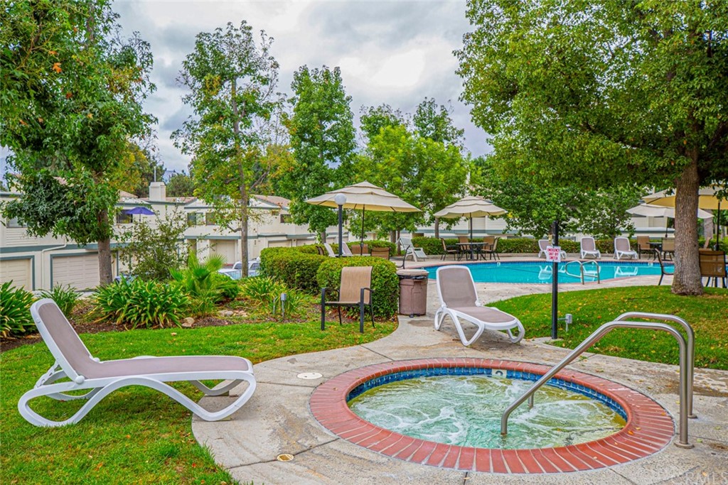 10504 Sunland Boulevard, Unit 5 Sunland, CA 91040 - Photo 59 of 66 a swimming pool with outdoor seating yard and outdoor seating