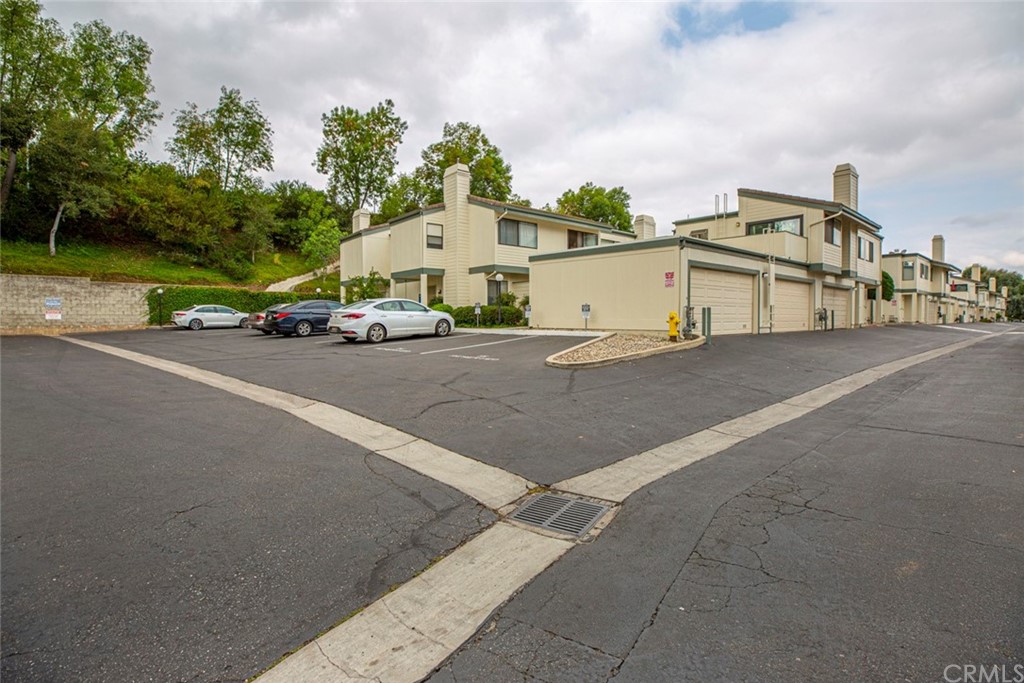 10504 Sunland Boulevard, Unit 5 Sunland, CA 91040 - Photo 61 of 66 a view of a street with a cars parked in front of it