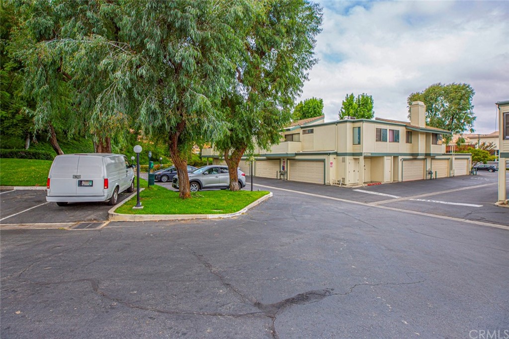 10504 Sunland Boulevard, Unit 5 Sunland, CA 91040 - Photo 62 of 66 a view of a house with a yard and sitting area
