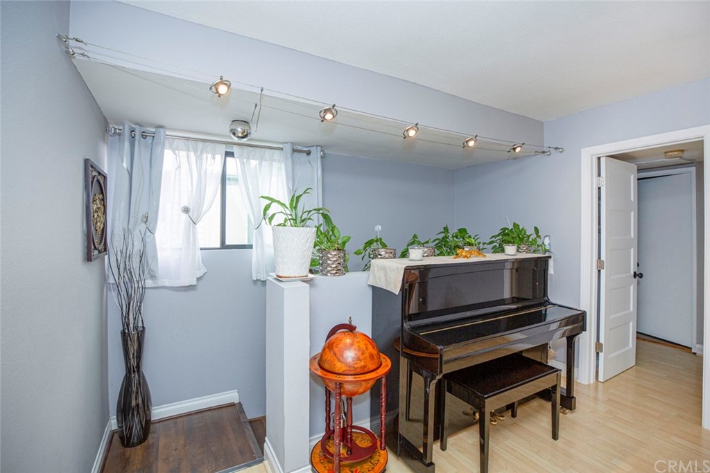 10504 Sunland Boulevard, Unit 5 Sunland, CA 91040 - Photo 7 of 66 a living room with furniture and a potted plant