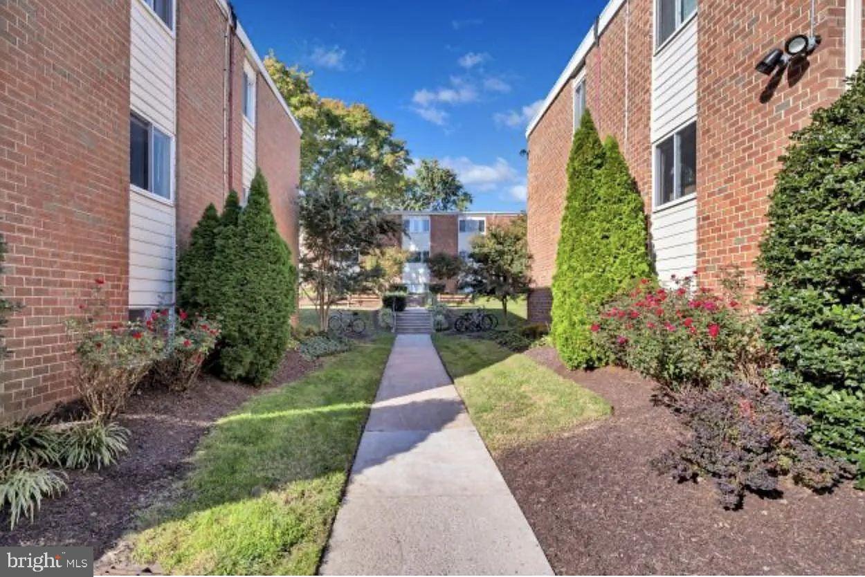 3500 Beech Avenue, Unit 3500A Baltimore, MD 21211 - Photo 7 of 7 a view of a pathway with house on both side