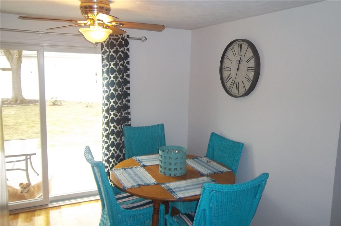 15 Phillips Road East Greenwich, RI 02818 - Photo 6 of 17 Dining area with sliders to a large composite deck.